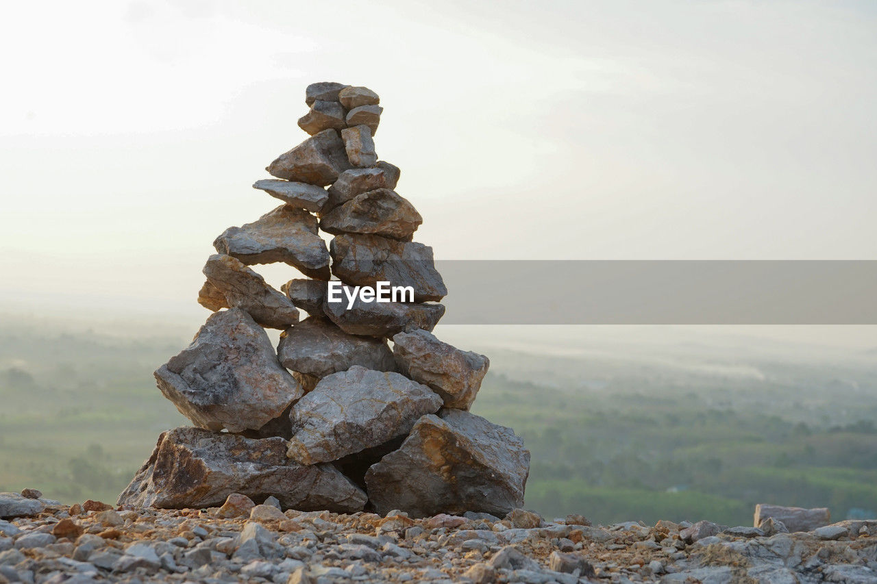 balance, rock, nature, zen-like, sky, mountain, tranquility, stone, environment, landscape, scenics - nature, no people, tranquil scene, beauty in nature, land, fog, outdoors, day, wilderness, non-urban scene, geology