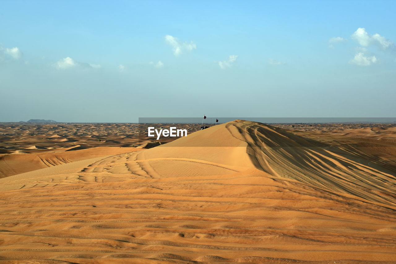 Scenic view of desert against sky