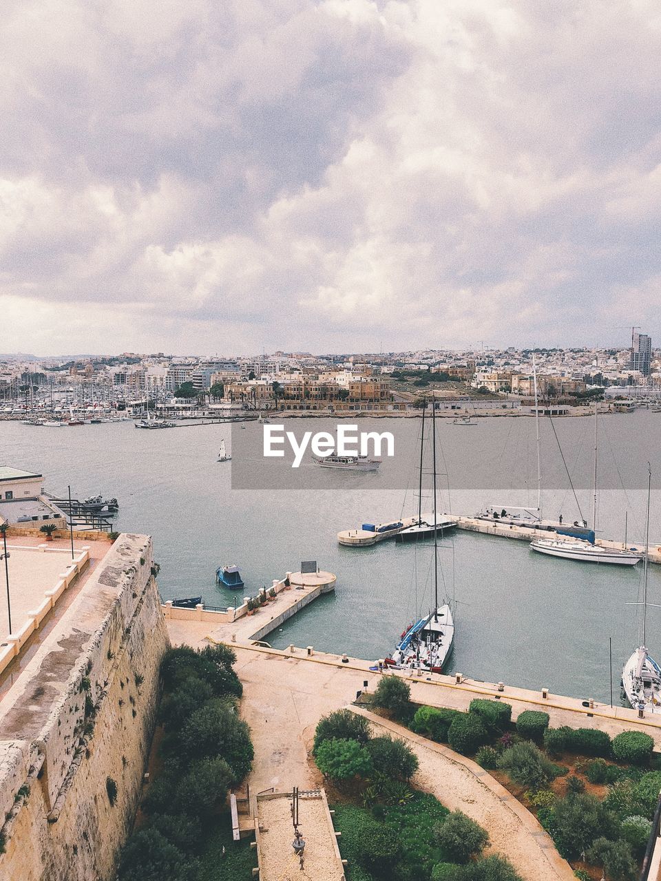 HIGH ANGLE VIEW OF MARINA AGAINST SKY