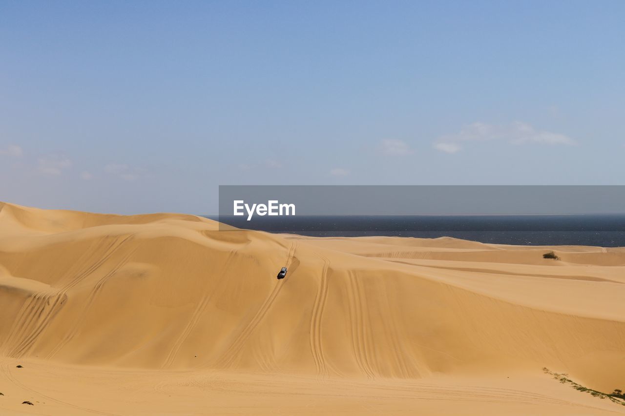 Scenic view of desert against sky