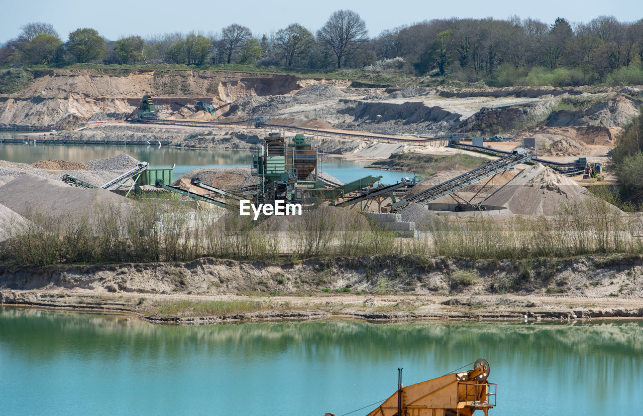 Gravel quarrying in a gravel pit during a drone flight