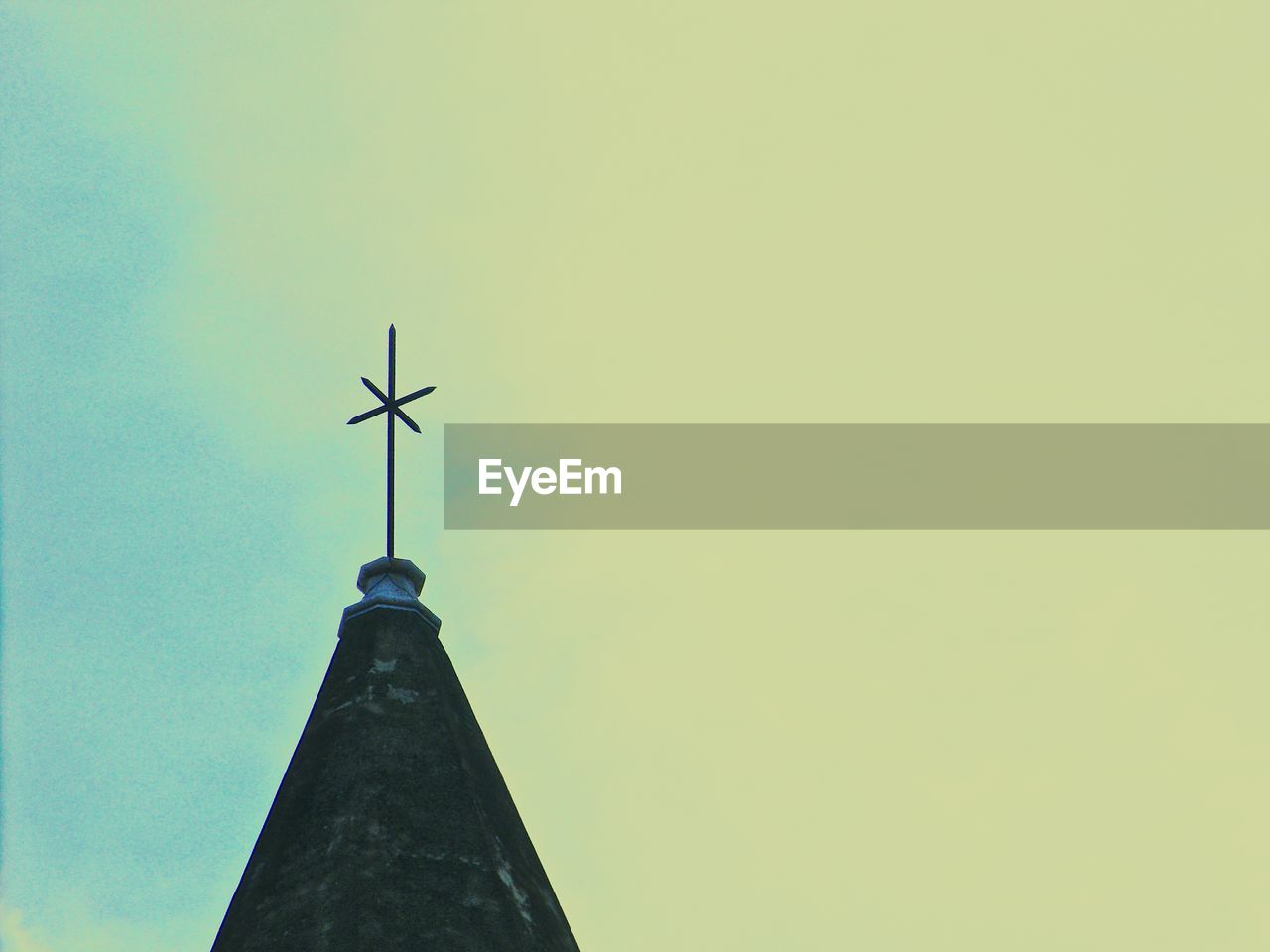 LOW ANGLE VIEW OF WINDMILL AGAINST CLEAR SKY