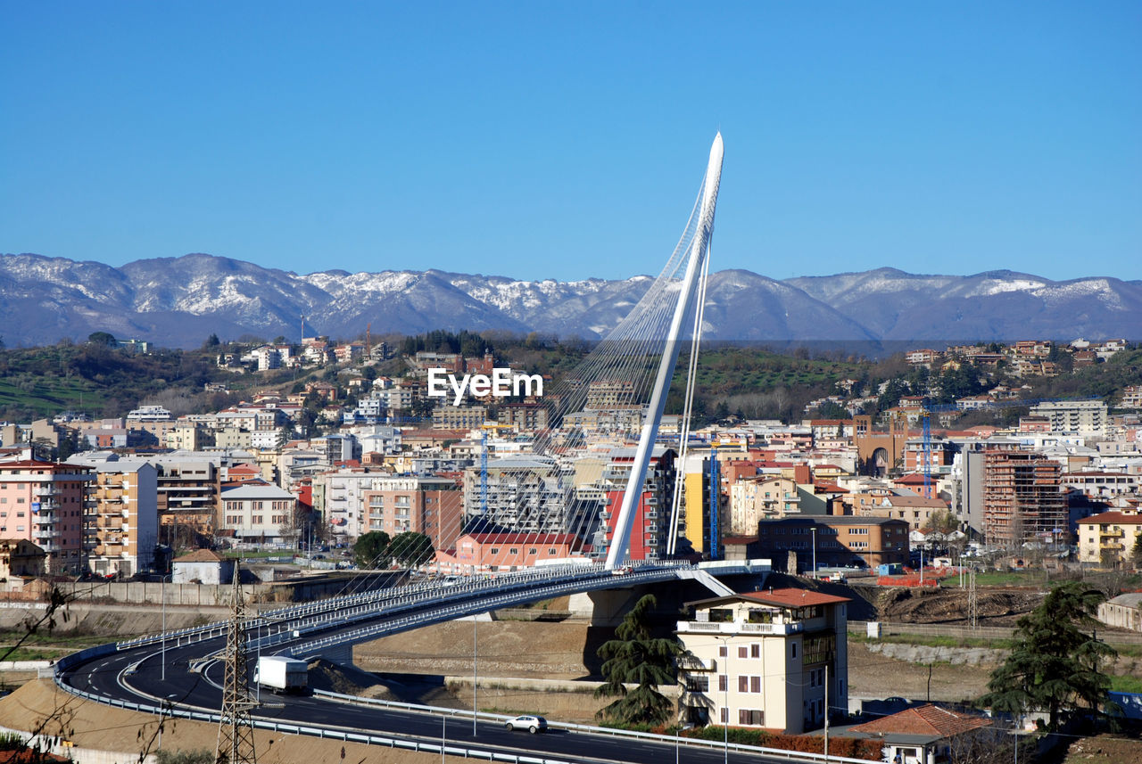 High angle view of buildings in city against sky