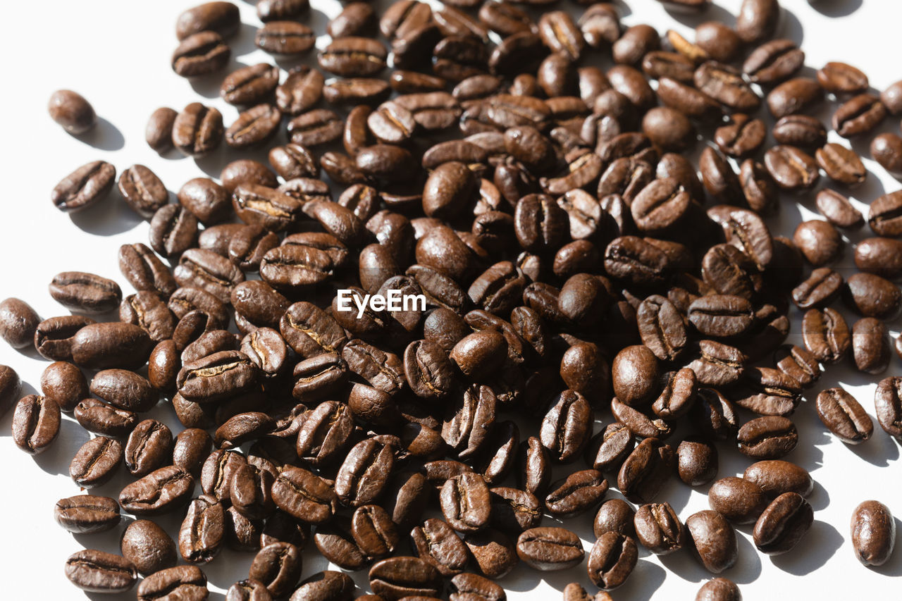 High angle view of coffee beans in plate