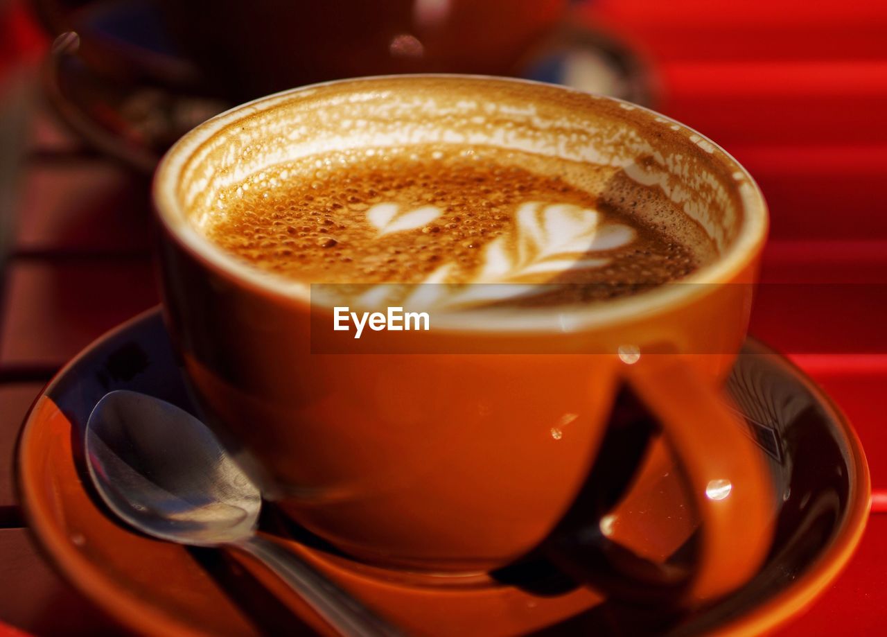 Close-up of cappuccino on table