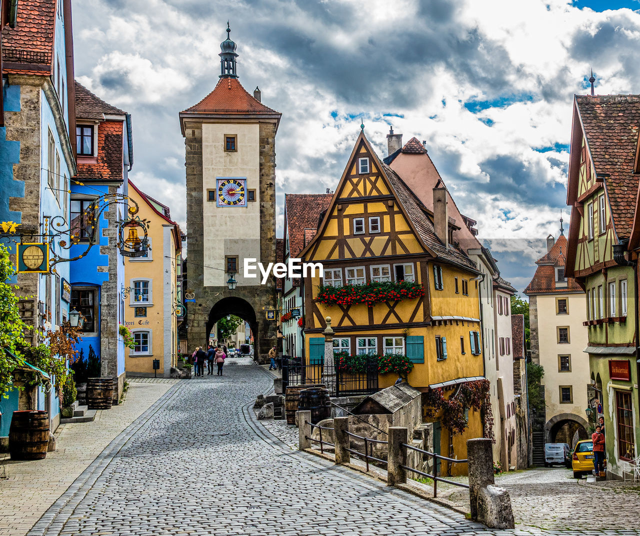 STREET AMIDST BUILDINGS IN CITY