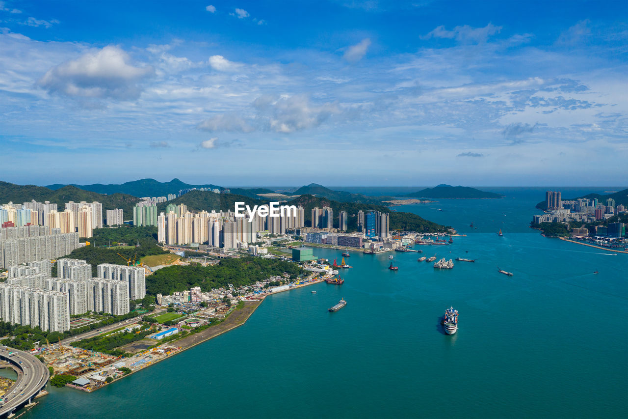 High angle view of city buildings at waterfront