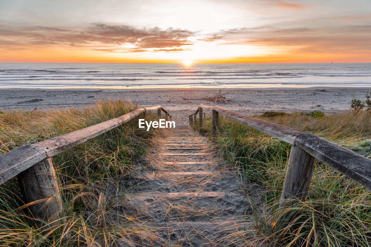 Beautiful sunrise at new brighton beach, christchurch, new zealand.