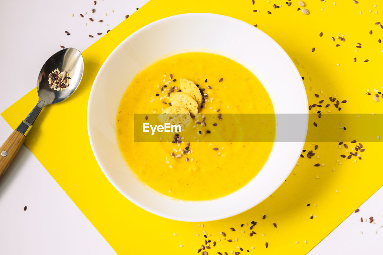 food and drink, food, yellow, healthy eating, kitchen utensil, produce, dish, eating utensil, freshness, wellbeing, directly above, plate, indoors, no people, bisque, vegetable, meal, egg