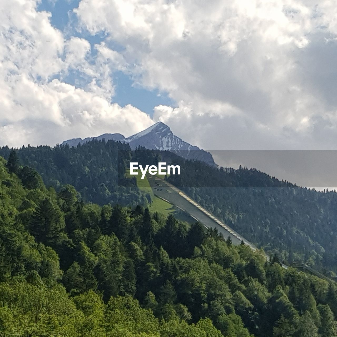 SCENIC VIEW OF MOUNTAIN AGAINST SKY