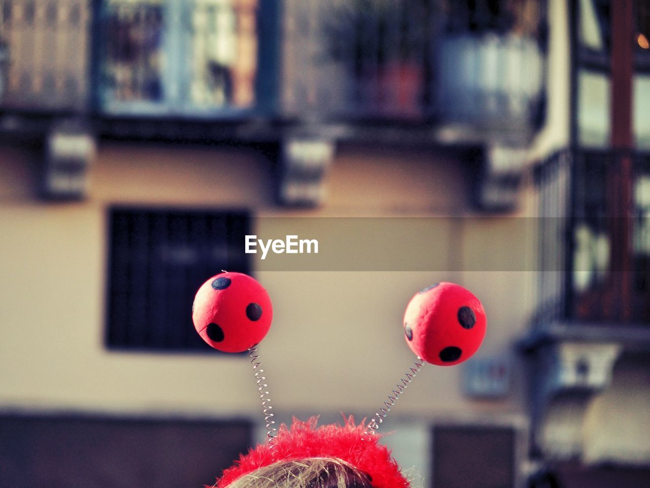 Close-up of a cropped carnival hat against blurred background