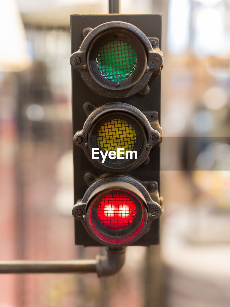 Vintage traffic lights with red light- street signal.