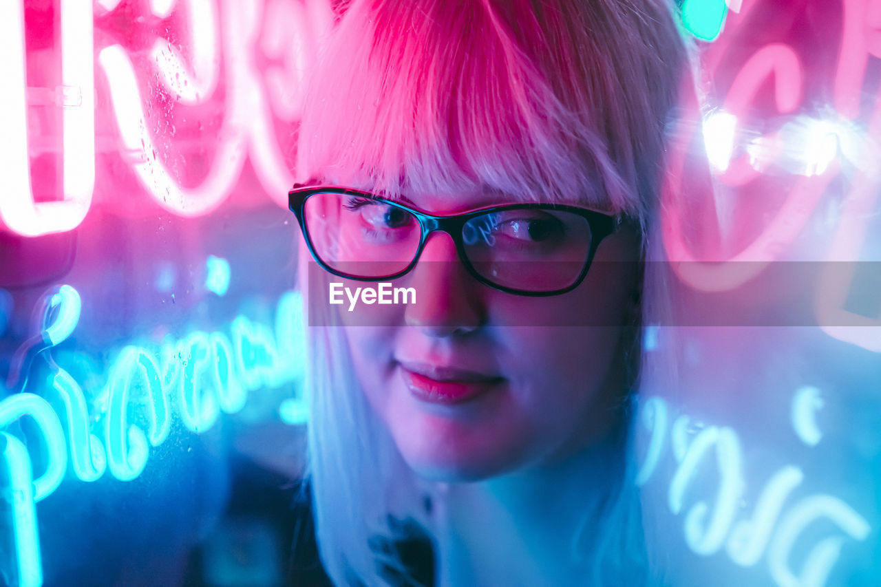 Close-up of woman wearing eyeglasses