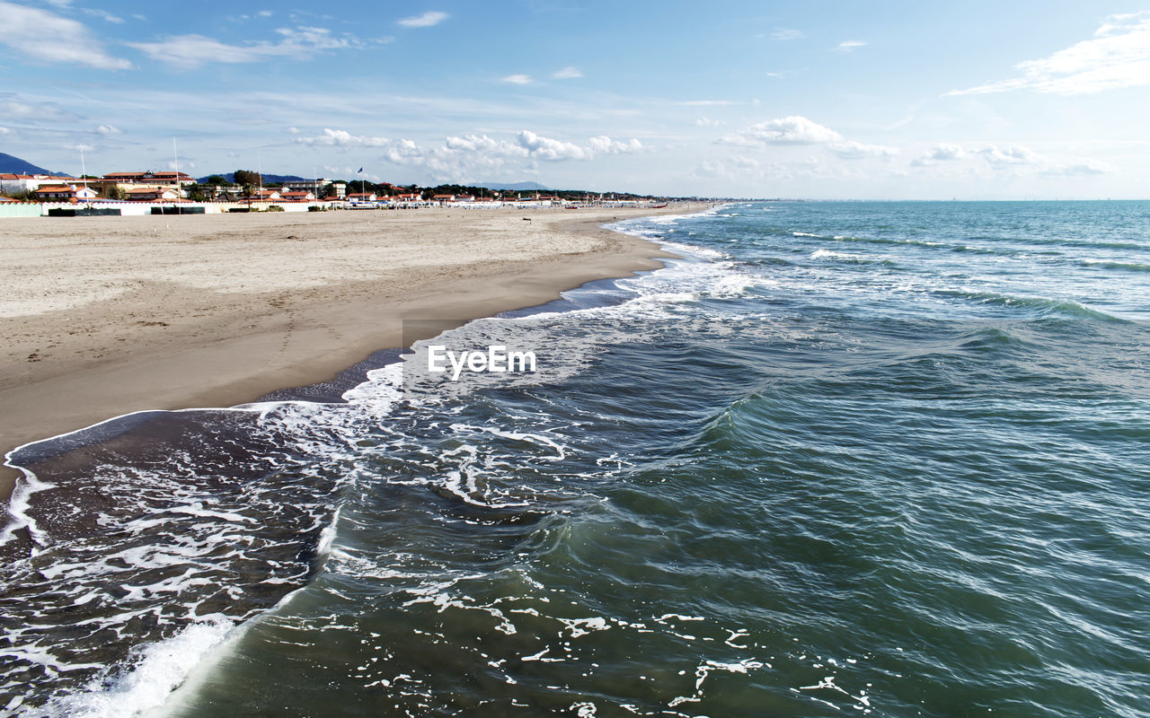 Scenic view of beach against sky