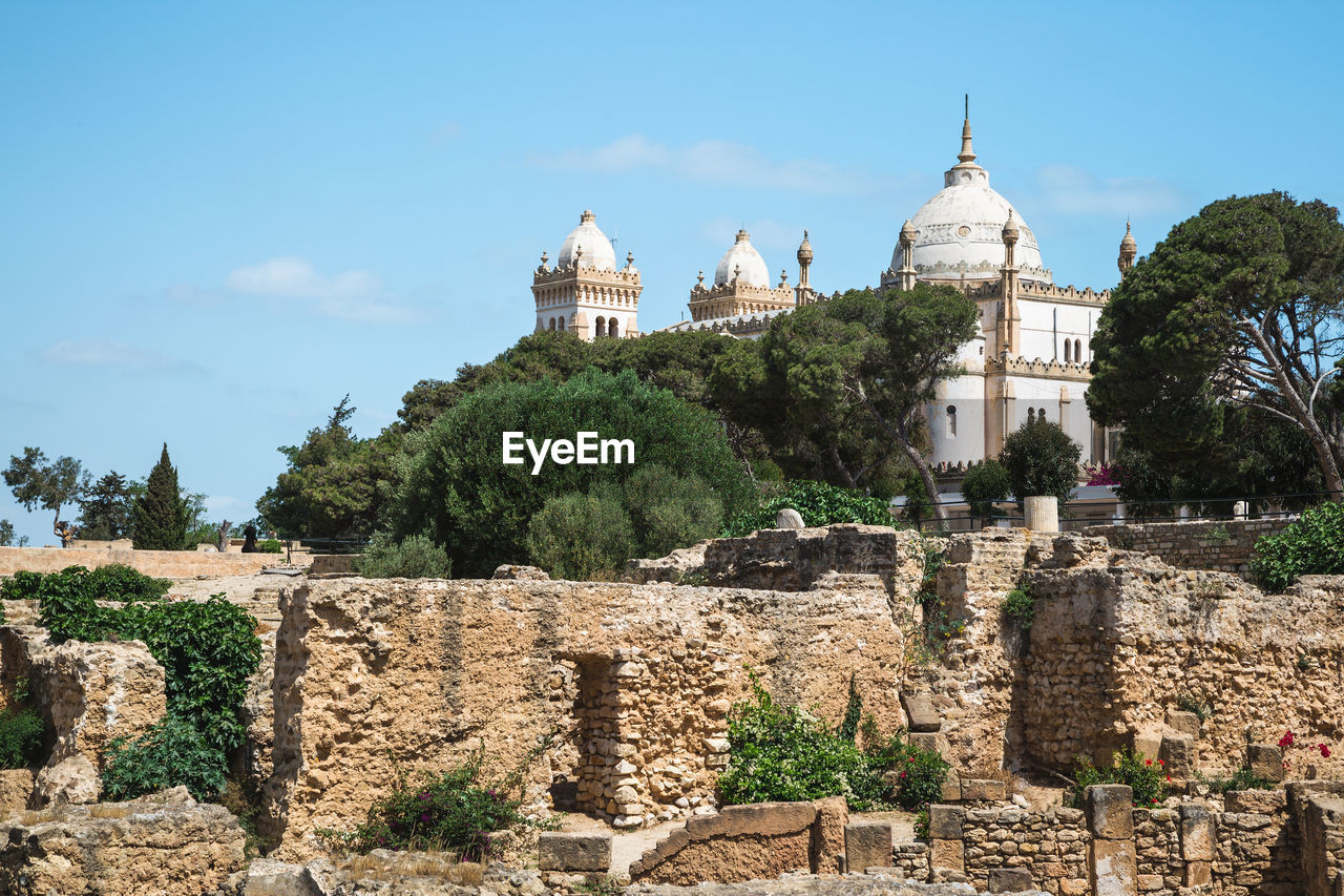 View from ruins of punic district on byrsa hill on saint louis cathedral in carthage, tunisia.