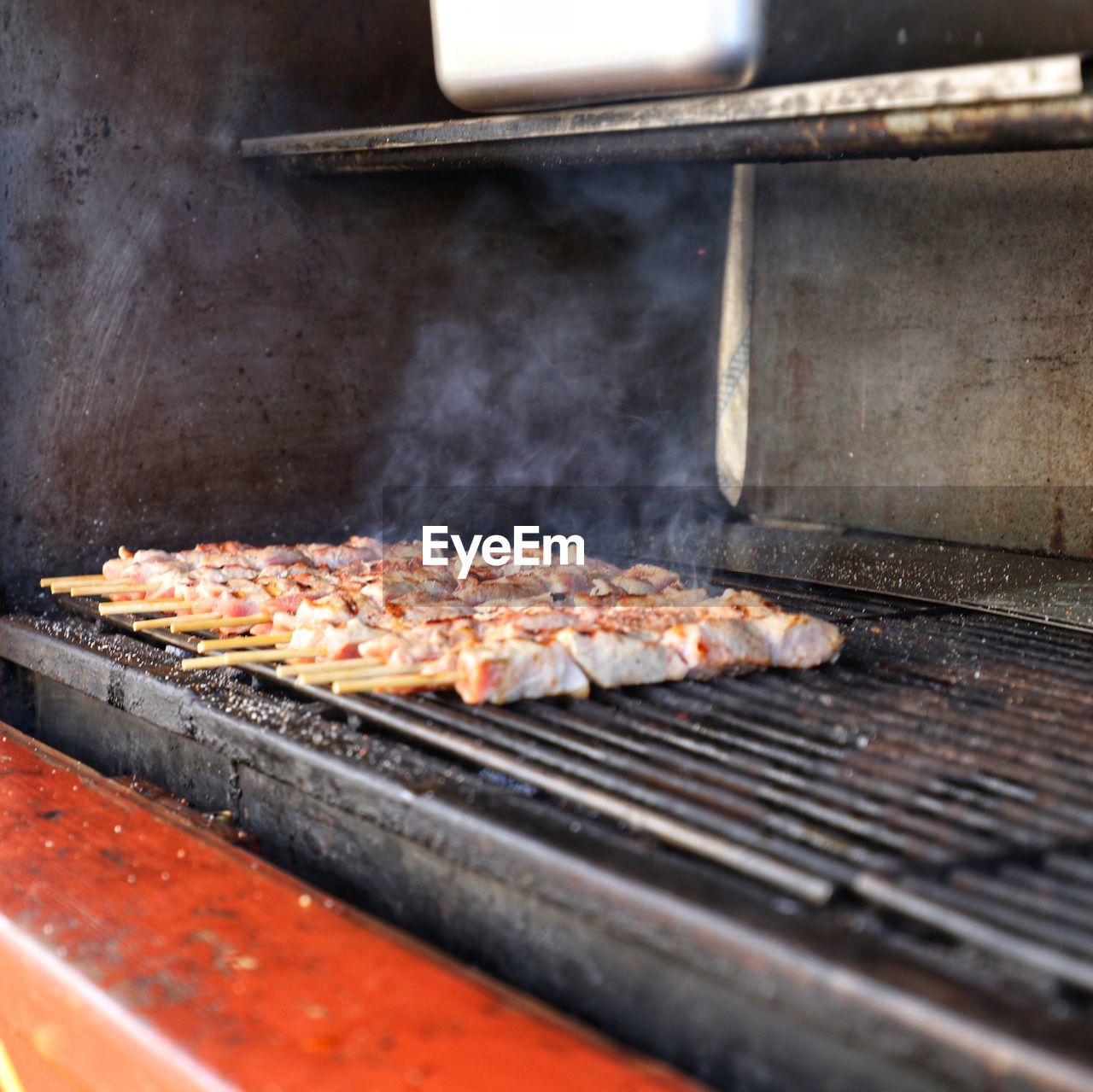 Close-up of meat on barbecue grill