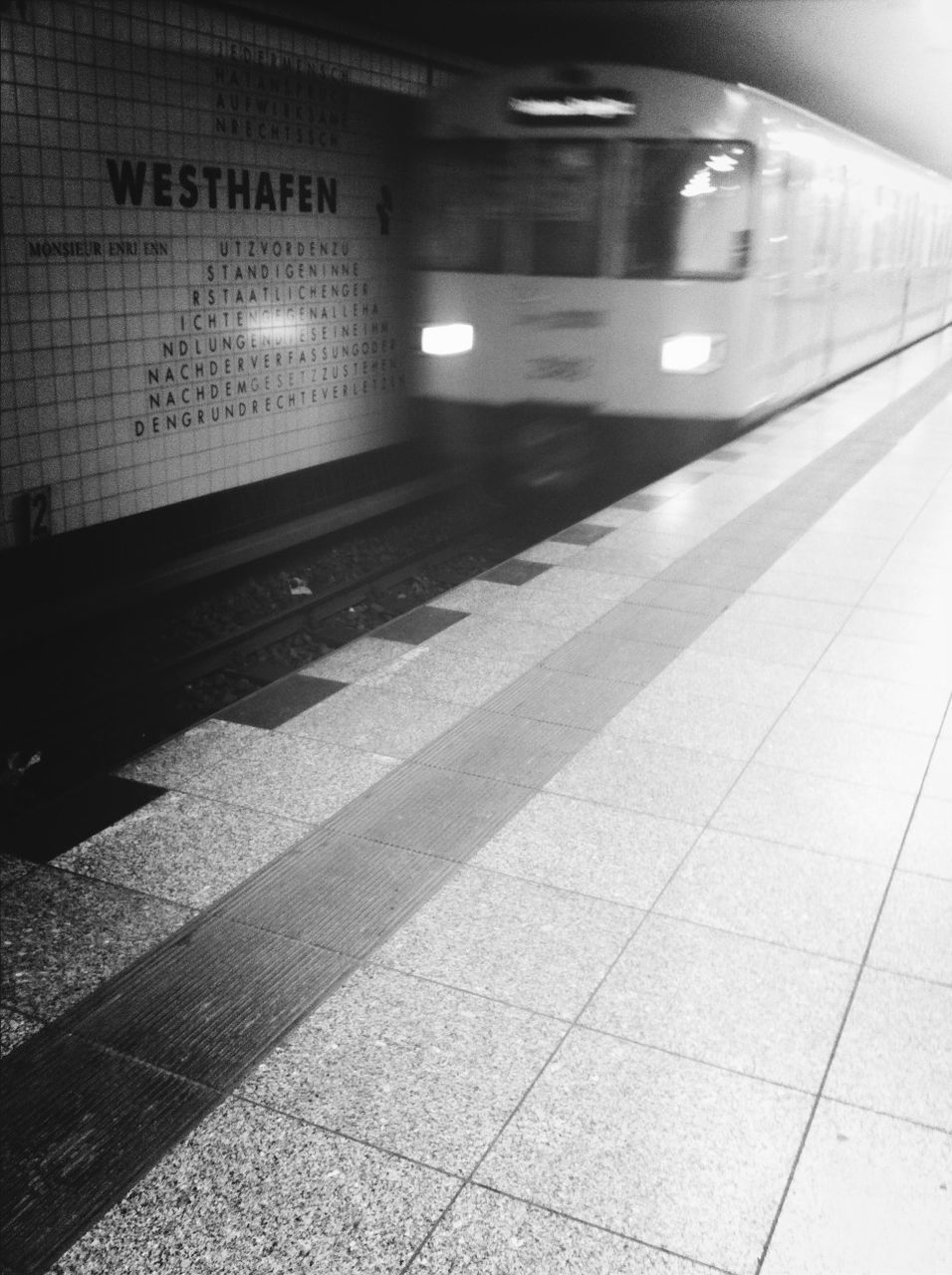 Train arriving on subway station platform