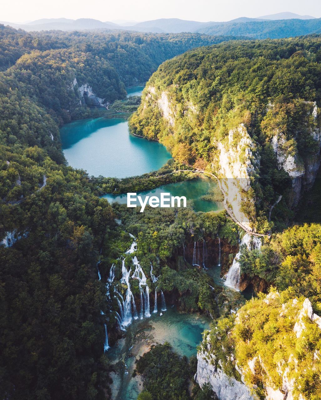 High angle view of river amidst mountains