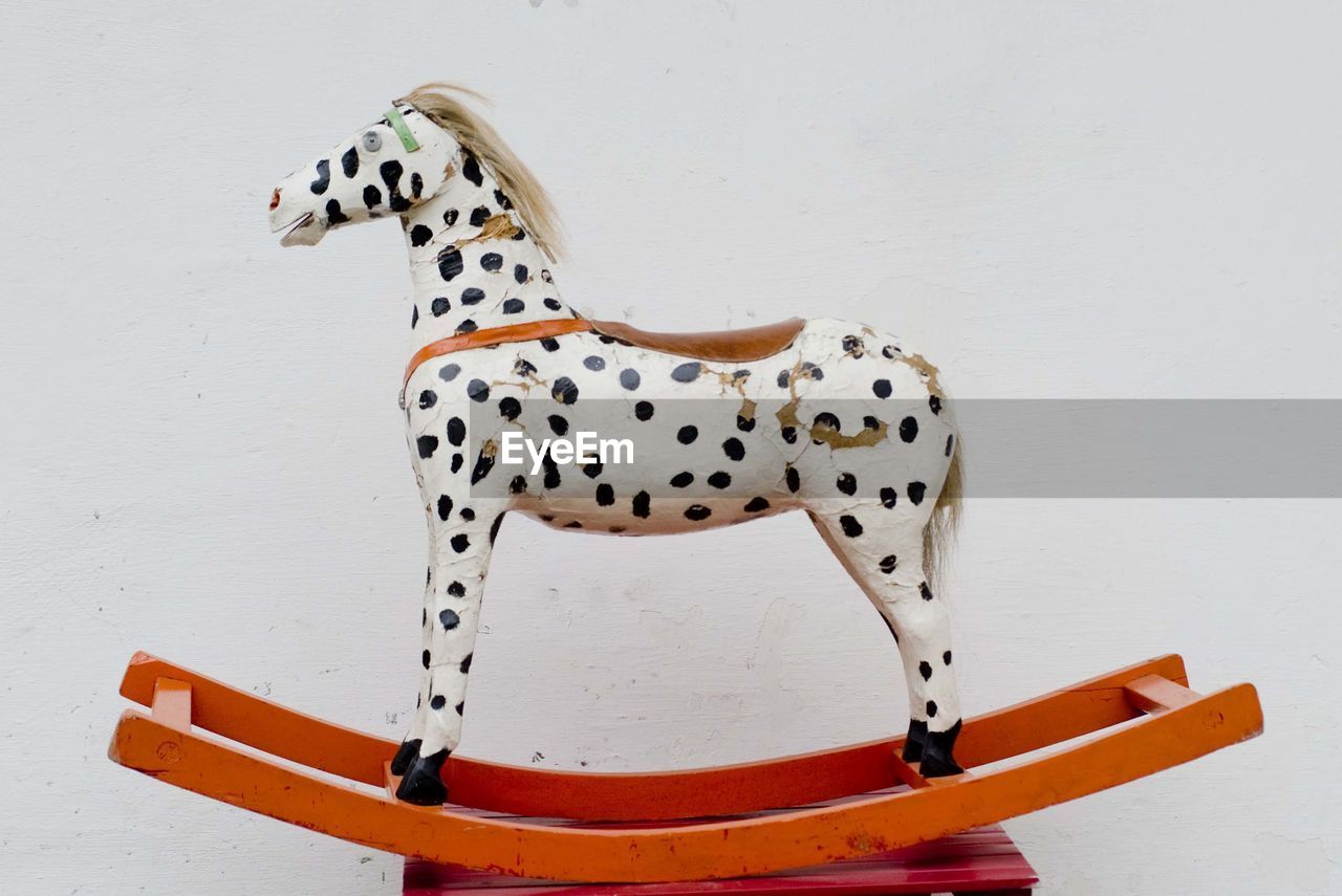 Old and used rocking horse, a play toy for children