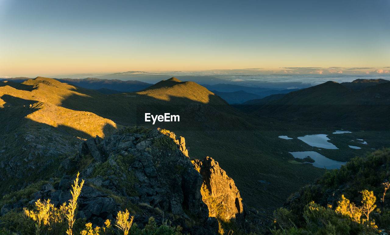 Scenic view of mountains during sunset