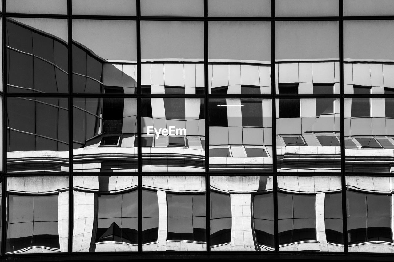 Full frame shot of modern building seen in a reflection