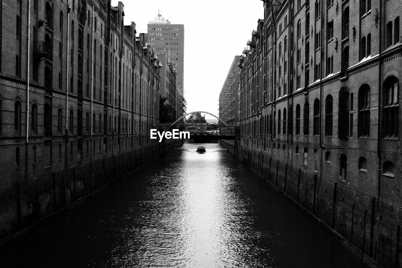 View of canal along buildings