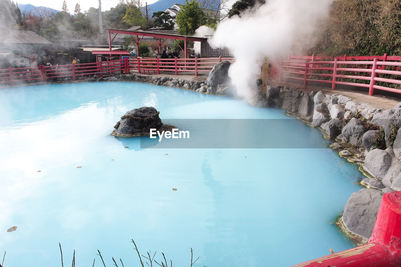 PANORAMIC VIEW OF SWIMMING POOL AT RESORT