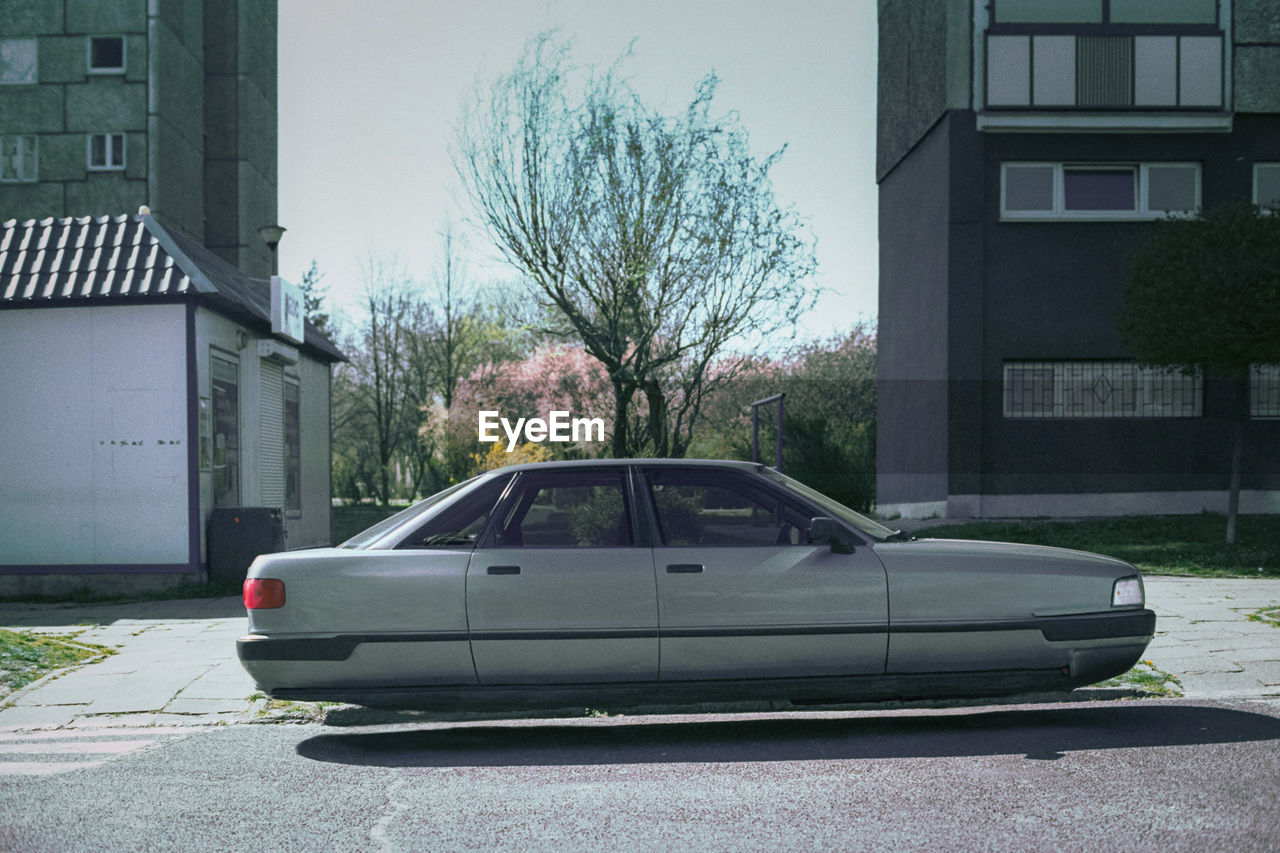 Retro futuristic car hovering above the ground.