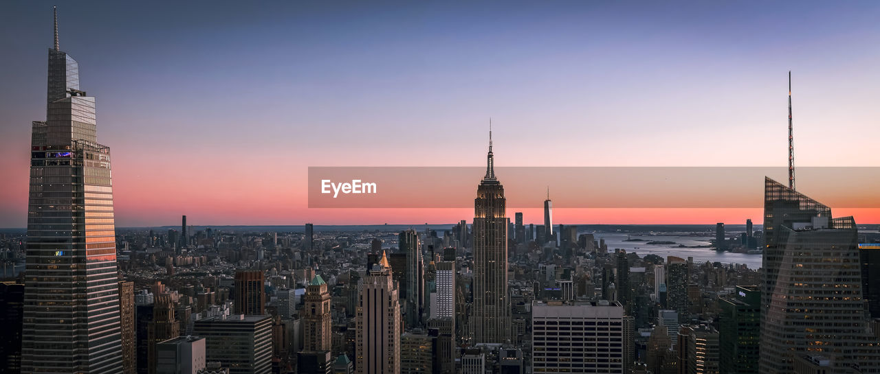 Modern buildings in city on sunset.new york city, united states of america