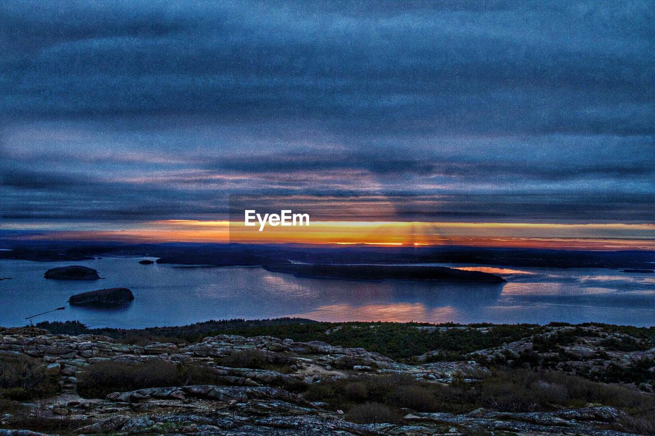 VIEW OF SEA AGAINST CLOUDY SKY