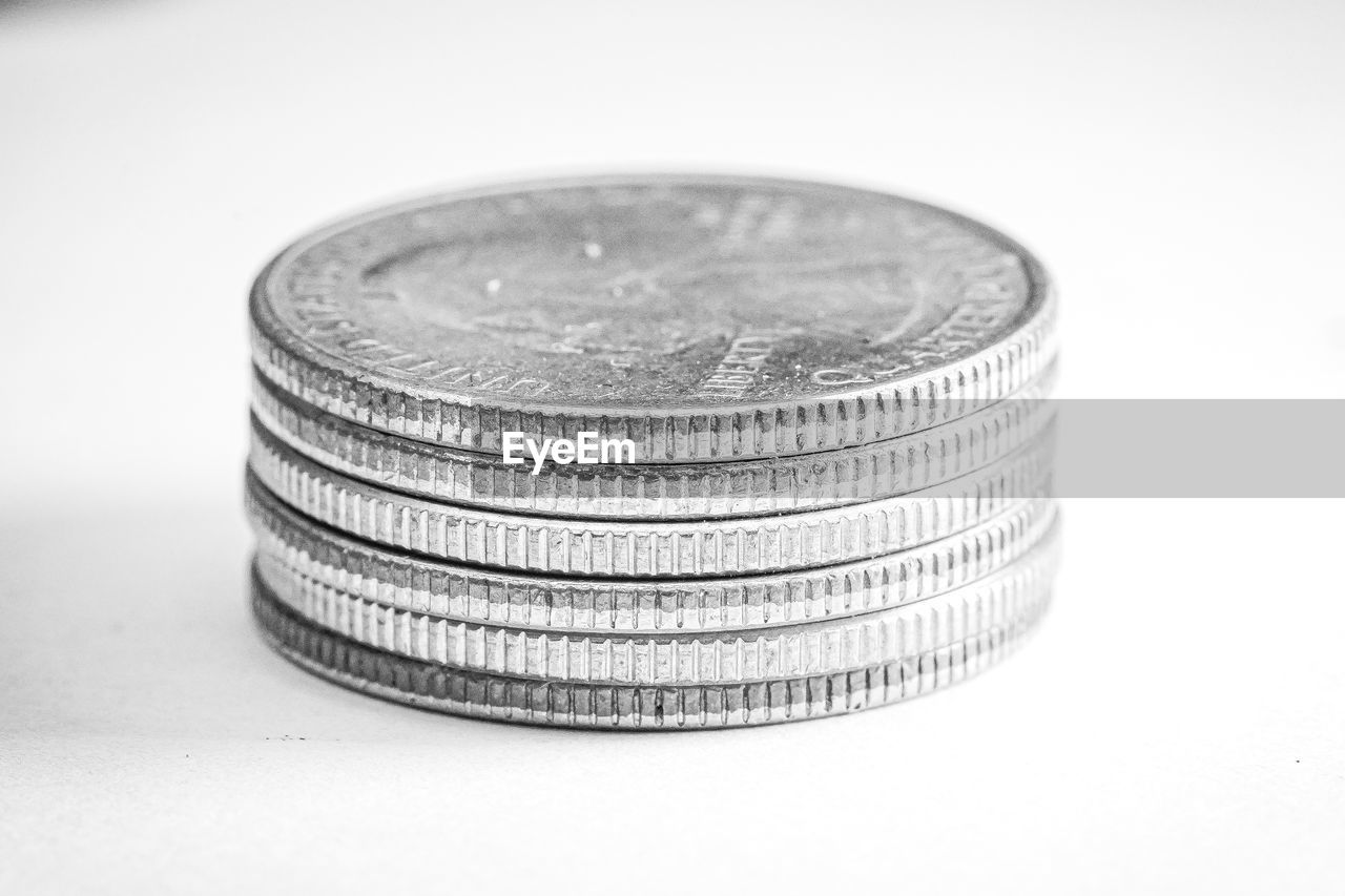 finance, money, currency, coin, business, wealth, savings, silver, cash, money handling, metal, finance and economy, investment, no people, close-up, indoors, business finance and industry, platinum