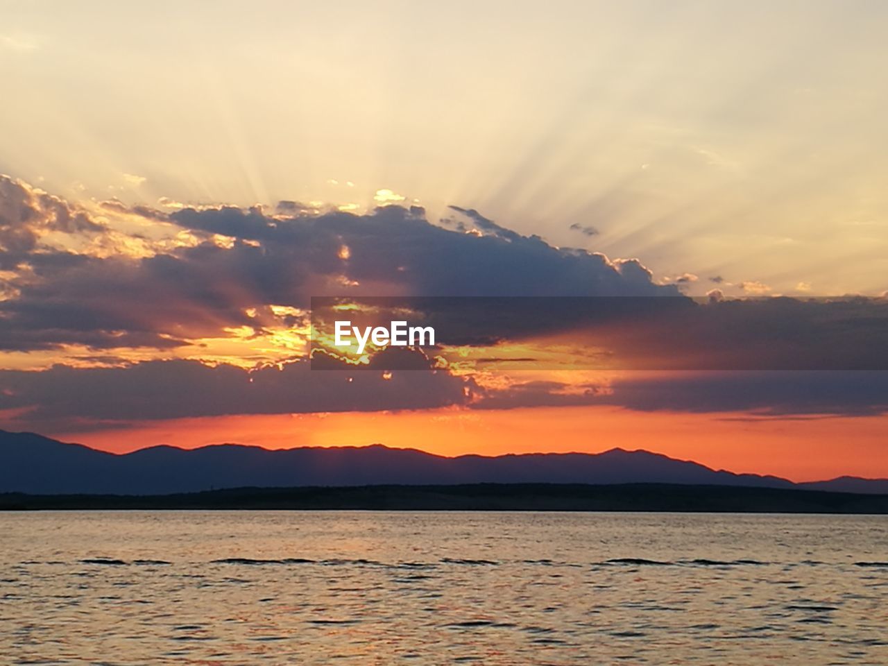 SCENIC VIEW OF SEA DURING SUNSET