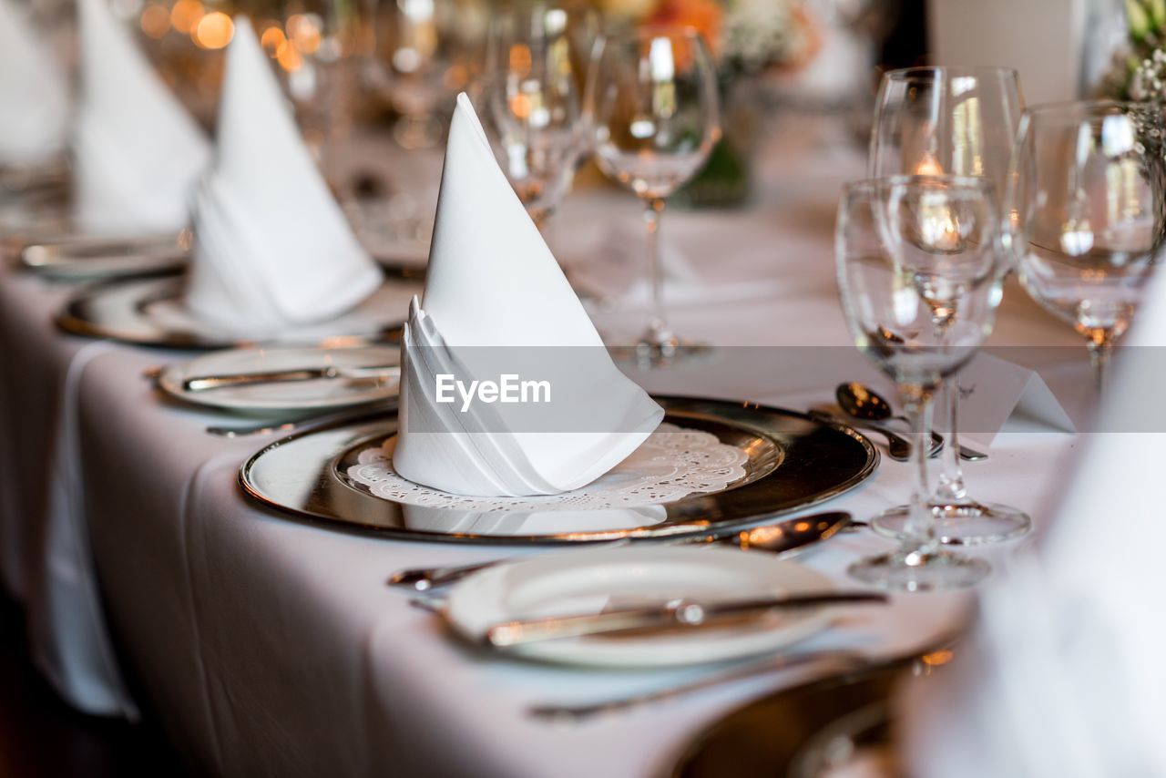Close-up of place setting on dining table