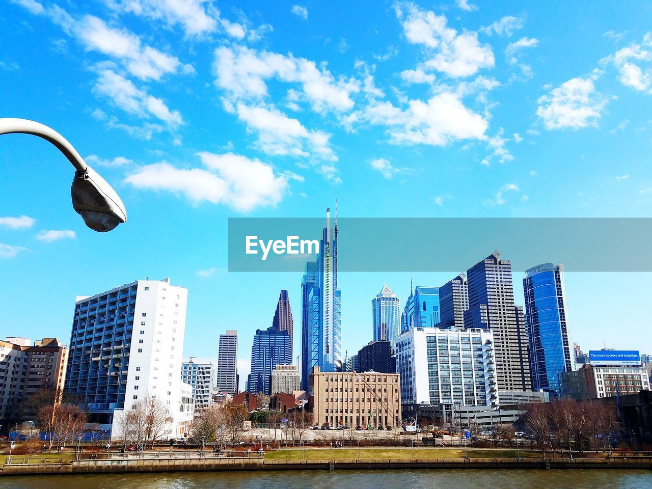 MODERN BUILDINGS AGAINST BLUE SKY