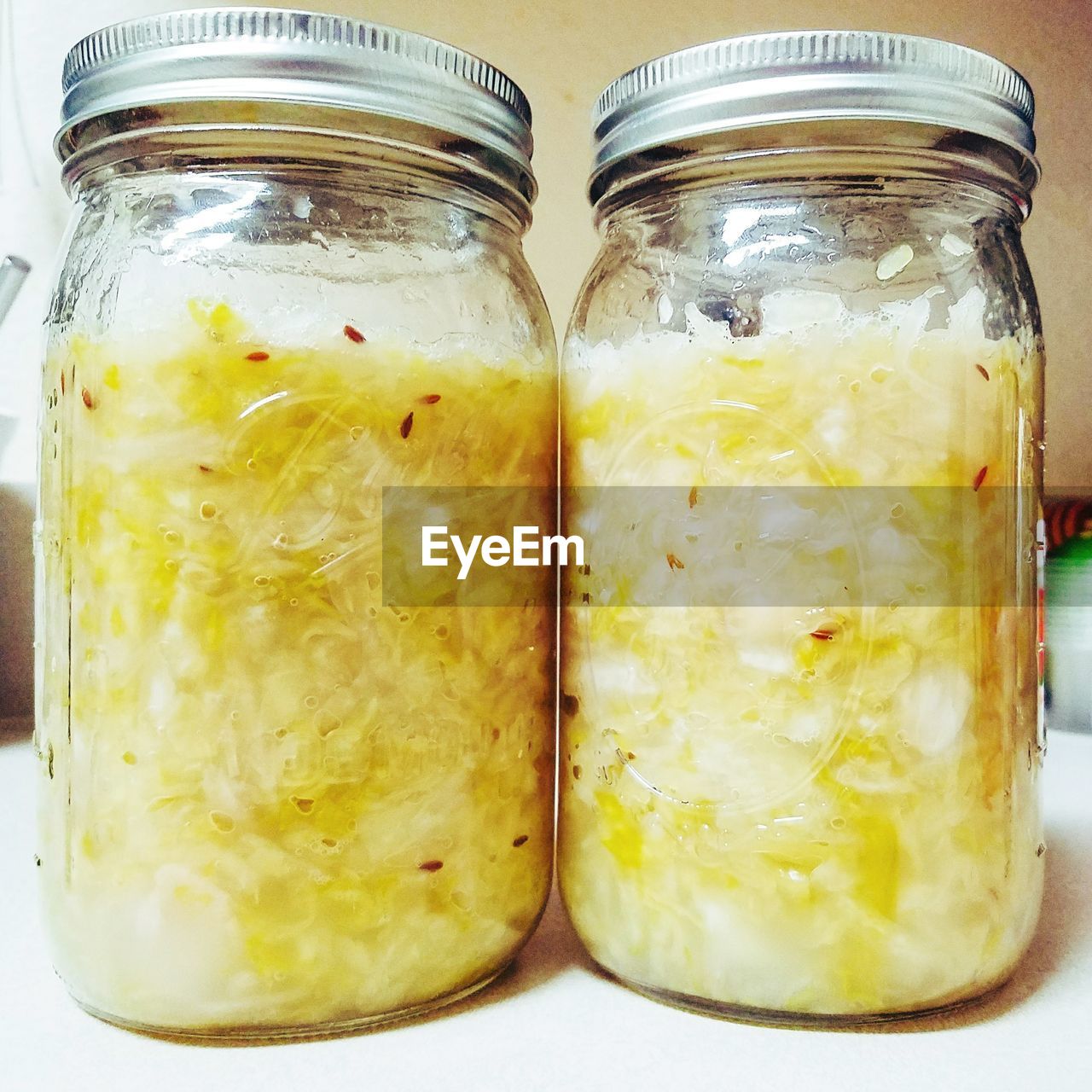 CLOSE-UP OF JAR OF DRINK