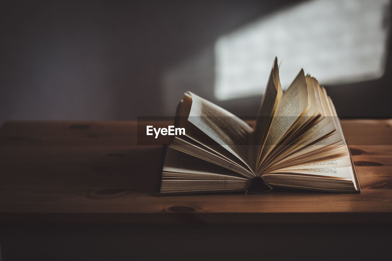 Close-up of open book on table