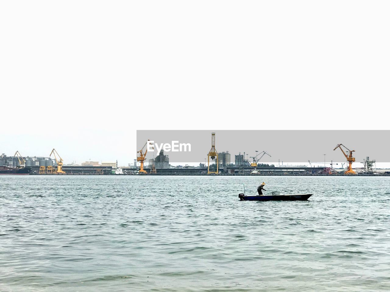 BOAT SAILING ON SEA AGAINST CLEAR SKY