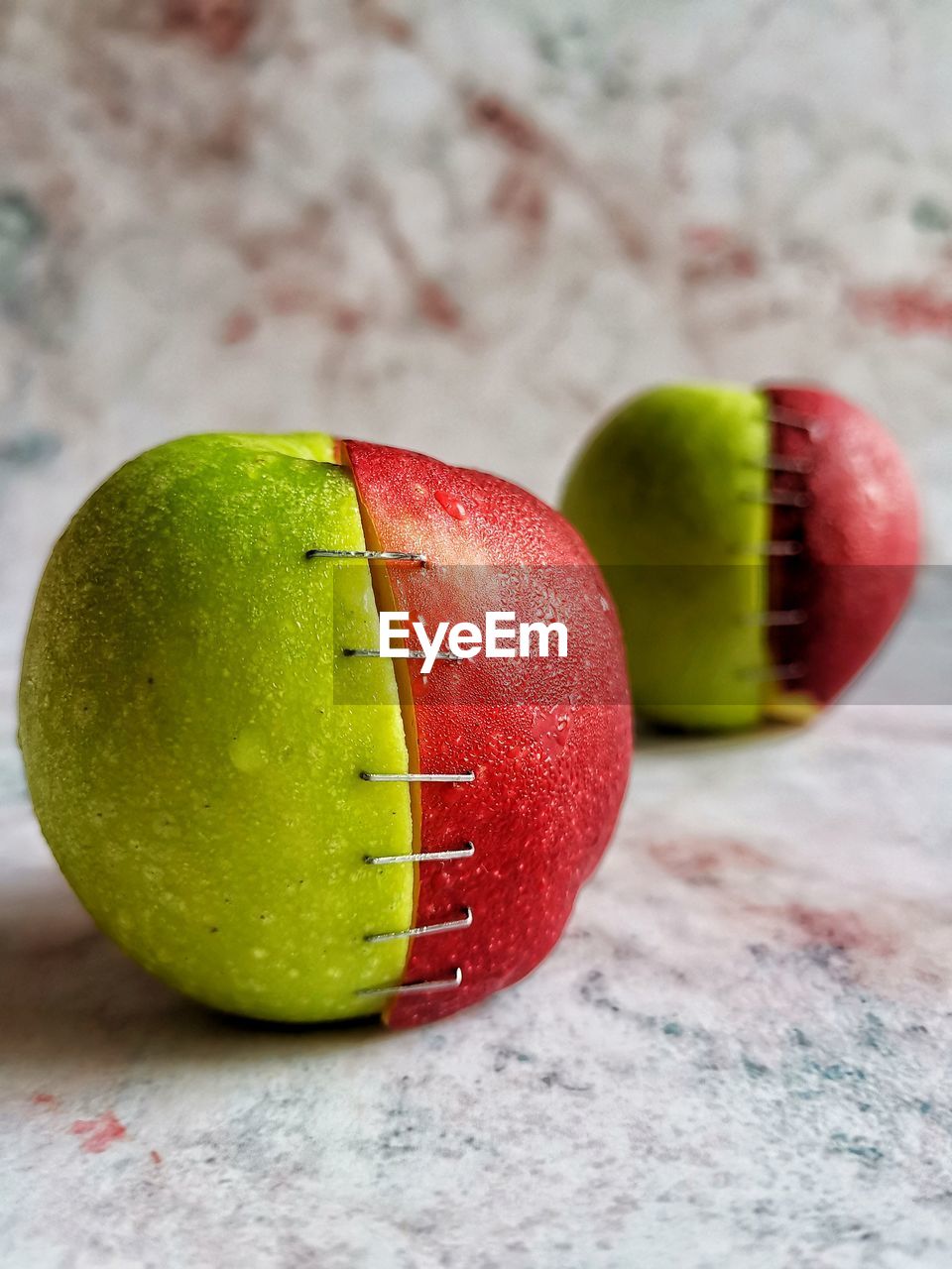 CLOSE-UP OF LEMON ON TABLE