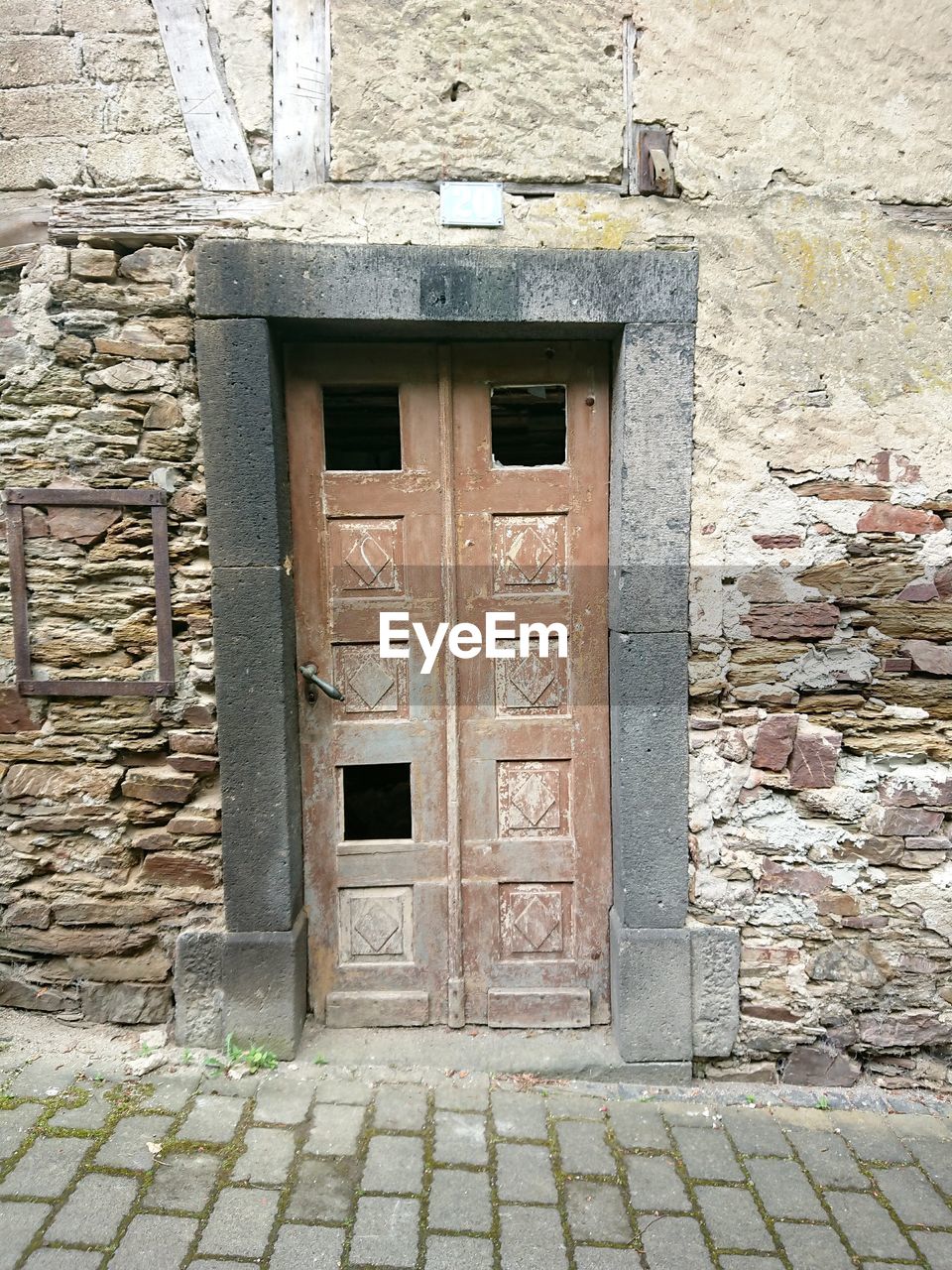 CLOSE-UP OF DOOR WITH BUILDING