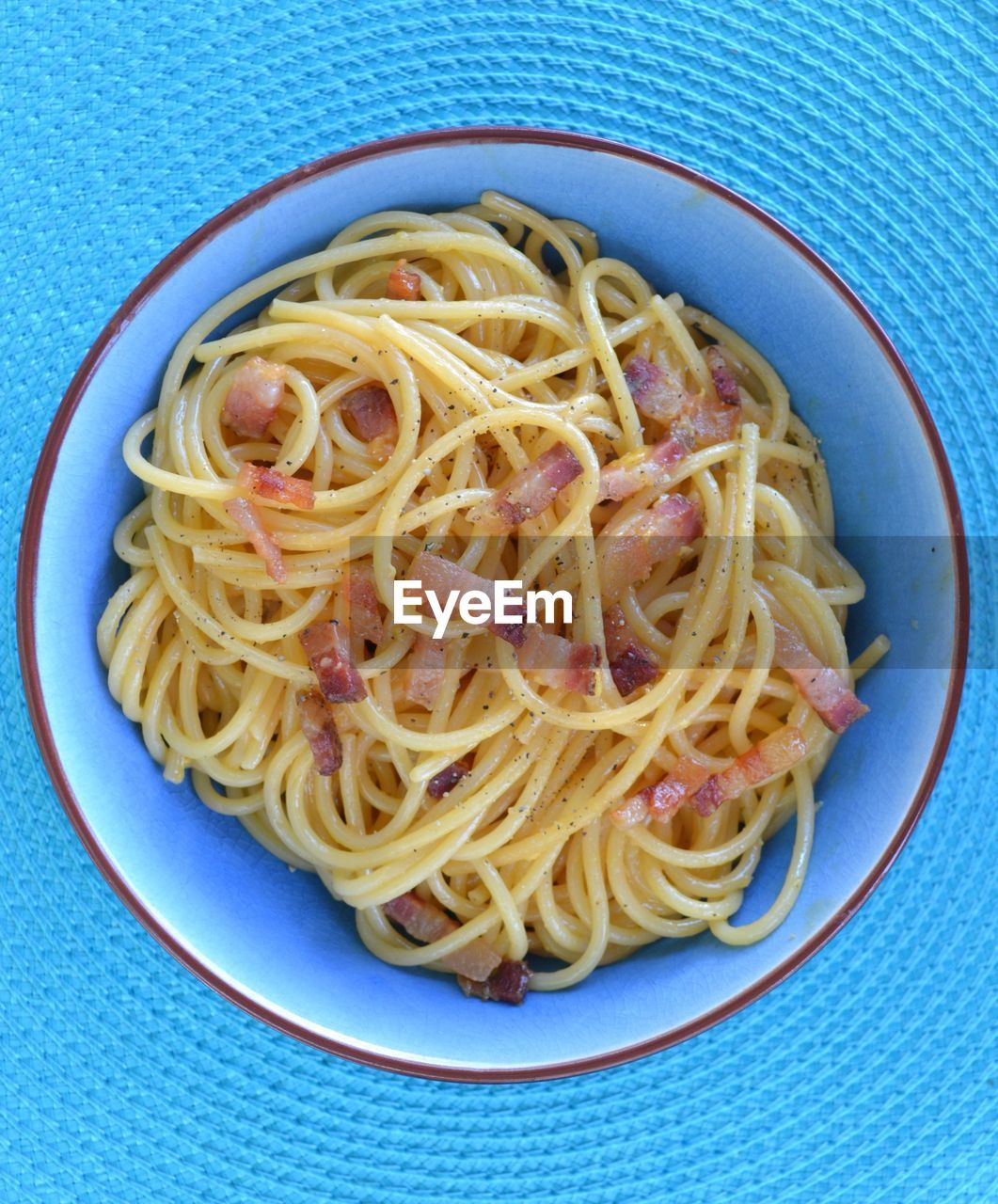 CLOSE-UP OF NOODLES WITH PASTA