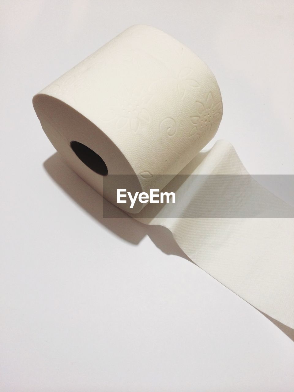 High angle view of toilet paper over white background