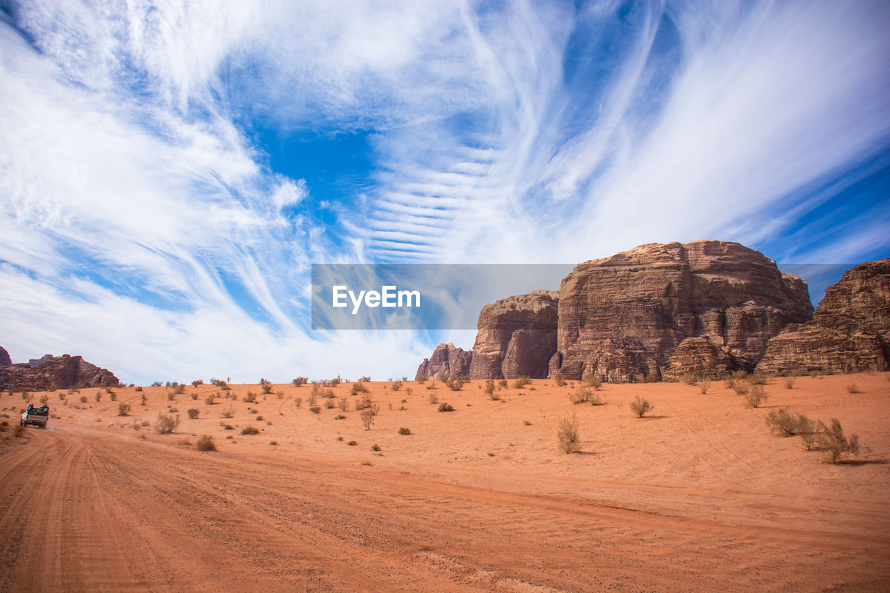 Panoramic view of desert against sky