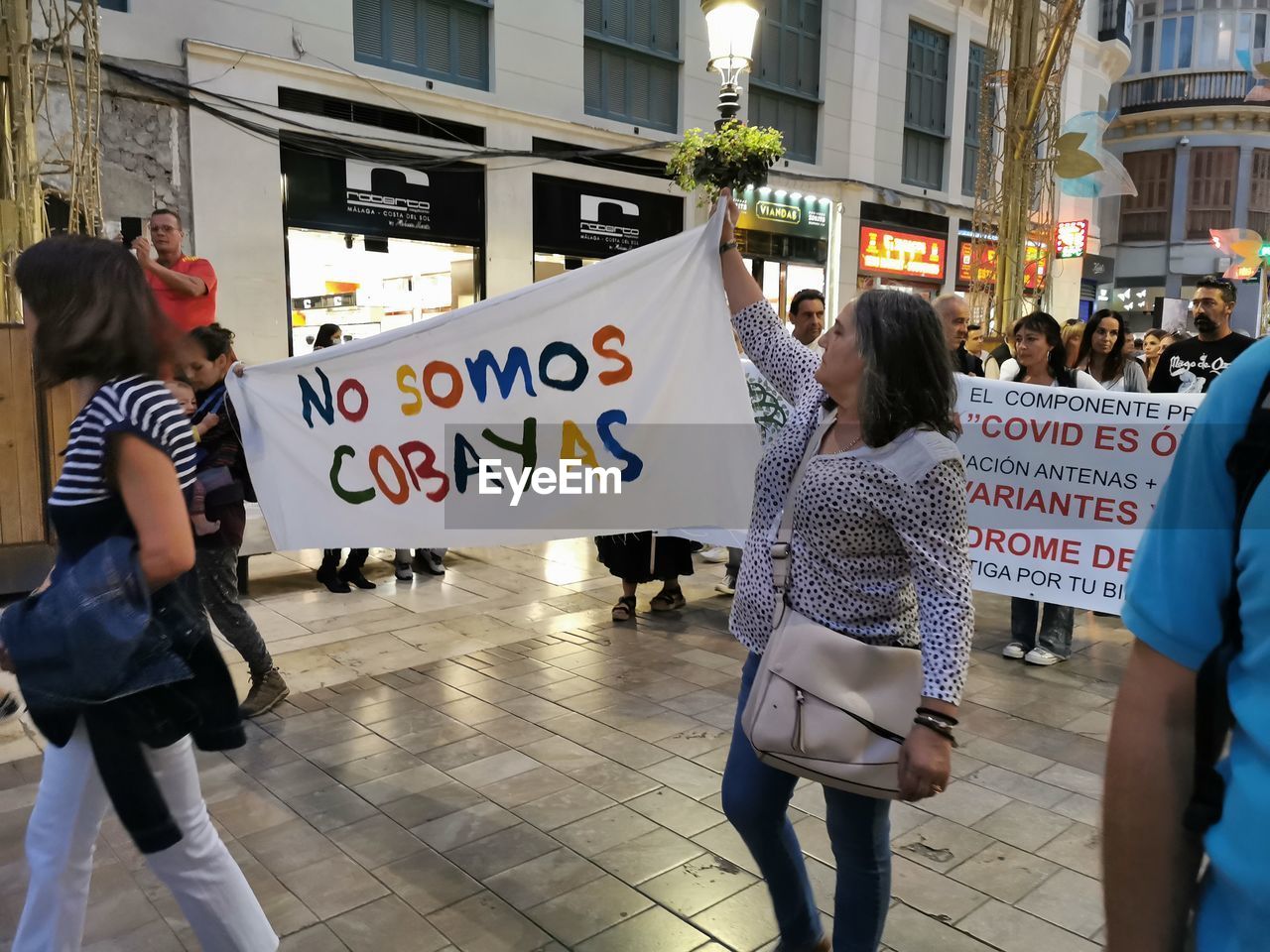 GROUP OF PEOPLE ON THE STREET