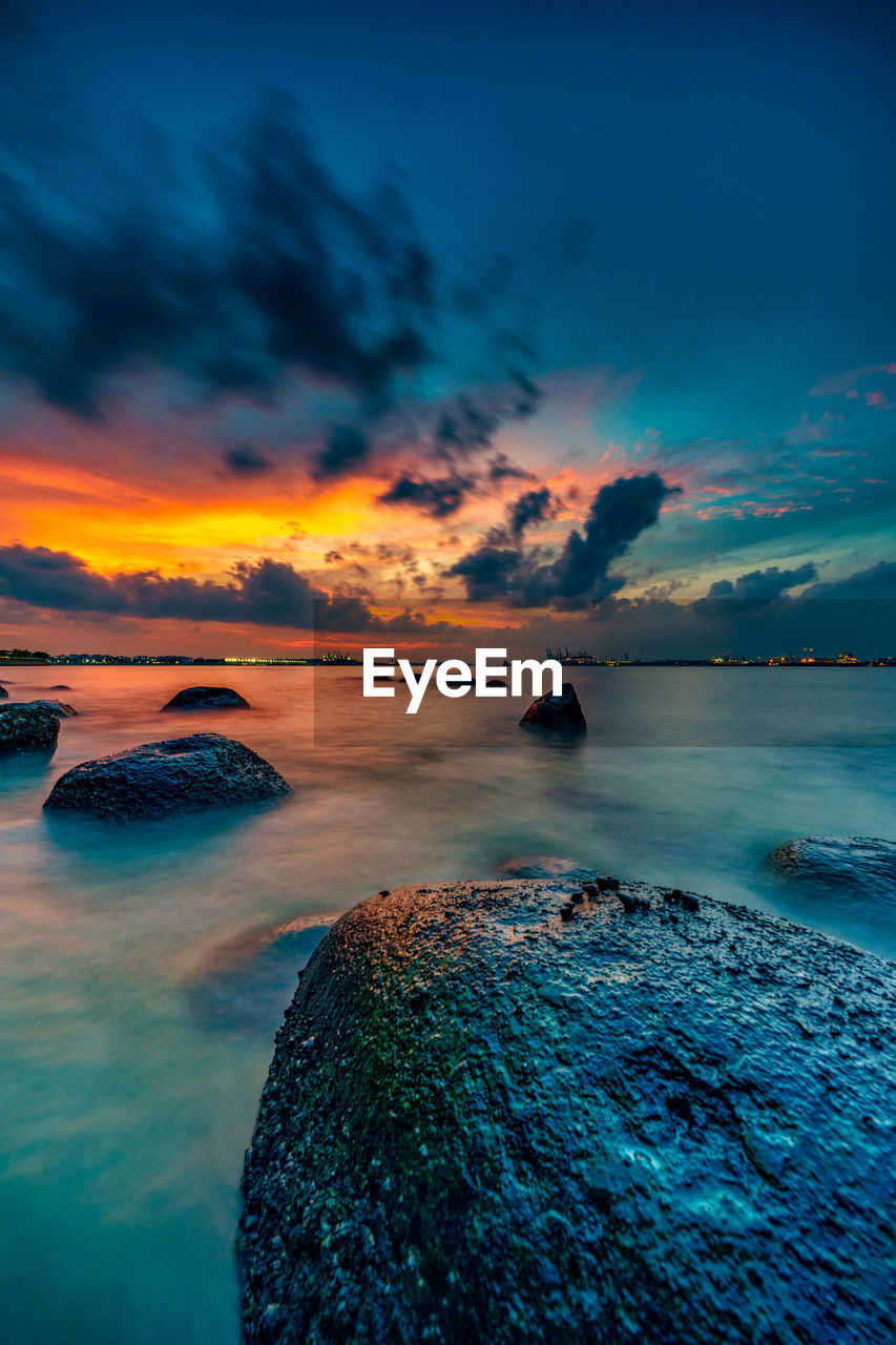 Scenic view of sea against sky during sunset