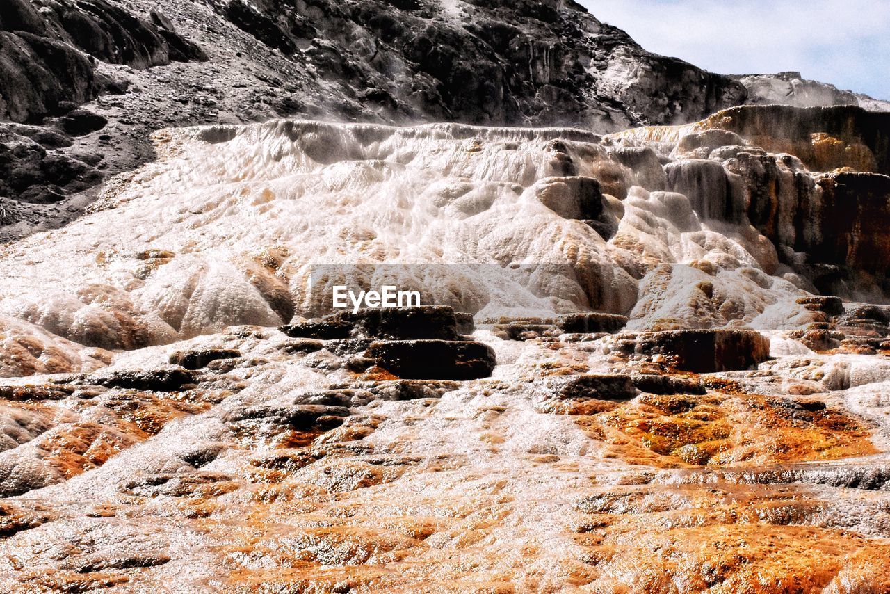 Hot spring formation through rocks