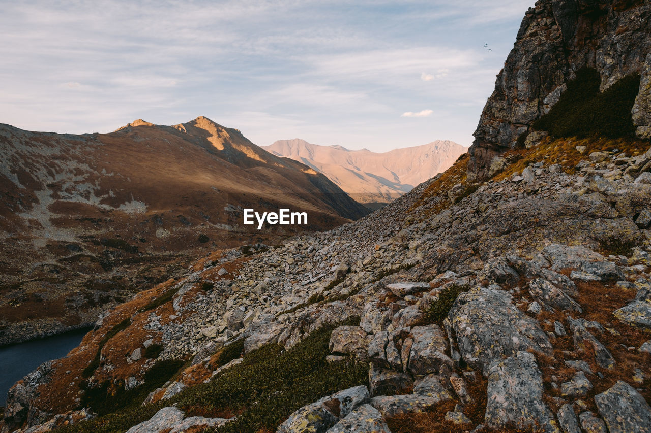 Scenic view of rocky mountains against sky