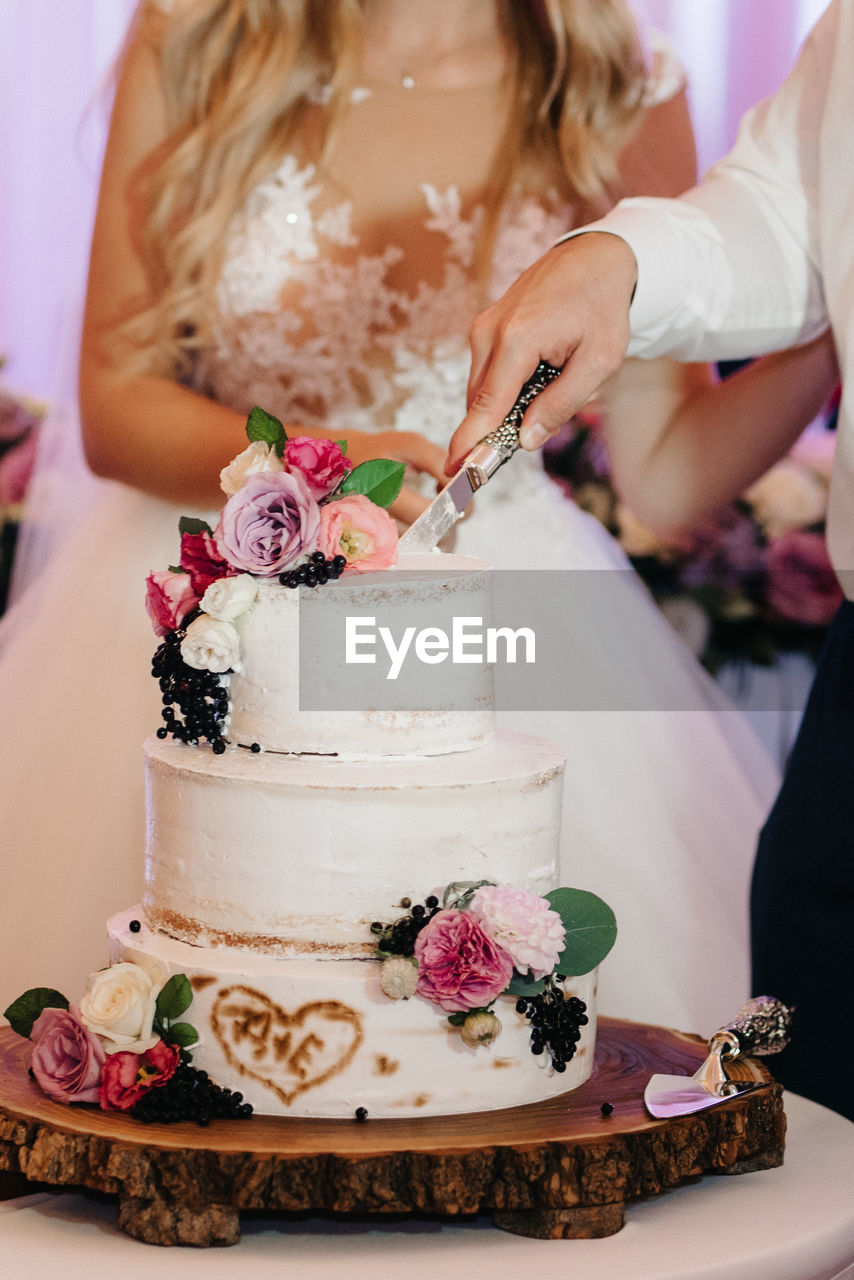 CLOSE-UP OF CAKE WITH ICE CREAM CONE