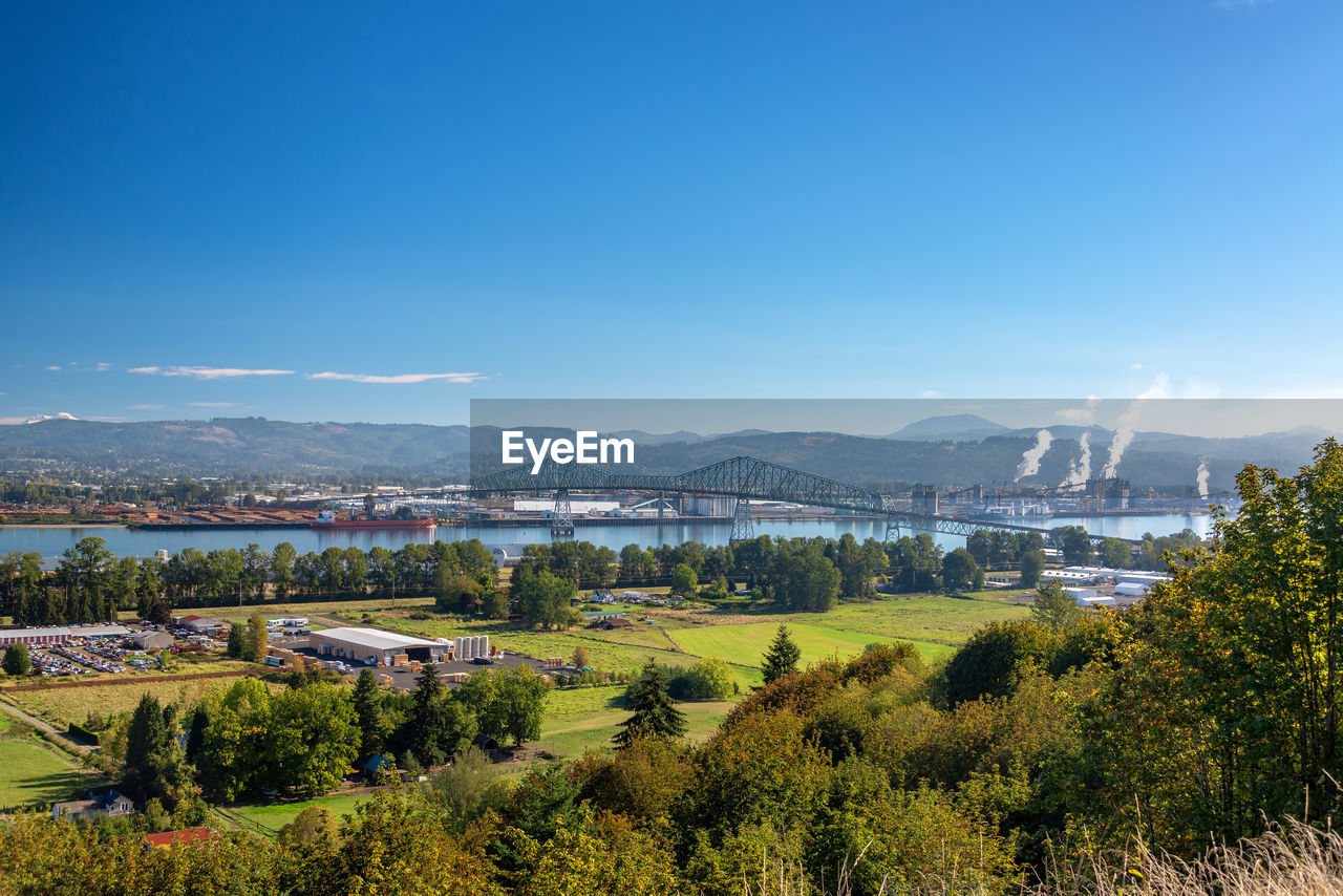 Scenic view of townscape against sky