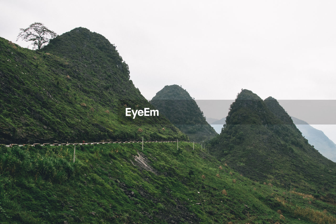 Scenic view of mountains against clear sky in vietnam