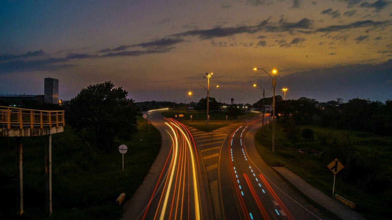High angle view of light trail on road